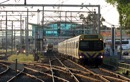 My train is sitting at the up home signal waiting for the up V/Line service to depart the centre platform whilst a down Pakenham and a down Cranbourne depart Dandenong. Nov. 2009
