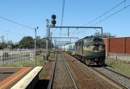 A 85 hauls a Somerton to Waurn Ponds empty cement train through Werribee. Nov. 17 2009.