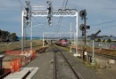 Down Geelong passenger train pass the works for the new track into Laverton. Dec.2009