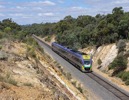 A down bendigo service, having exited Elphinstone tunnel, drifts towards the site of Chewton. March 2 2011
